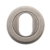 Oval Escutcheon - Round in Distressed Nickel - close-up detail view