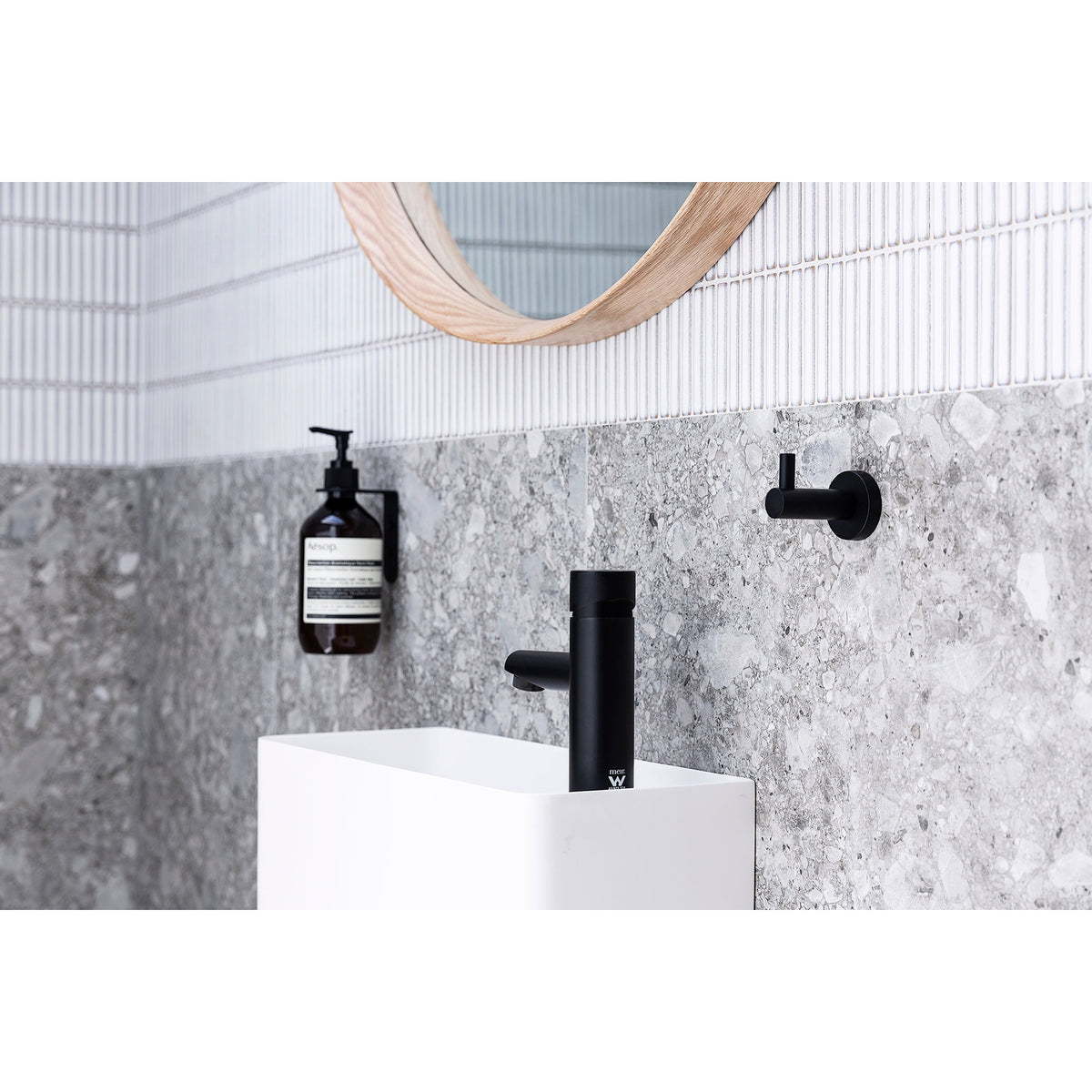 Round Pinless Basin Mixer in Matte Black - side profile view