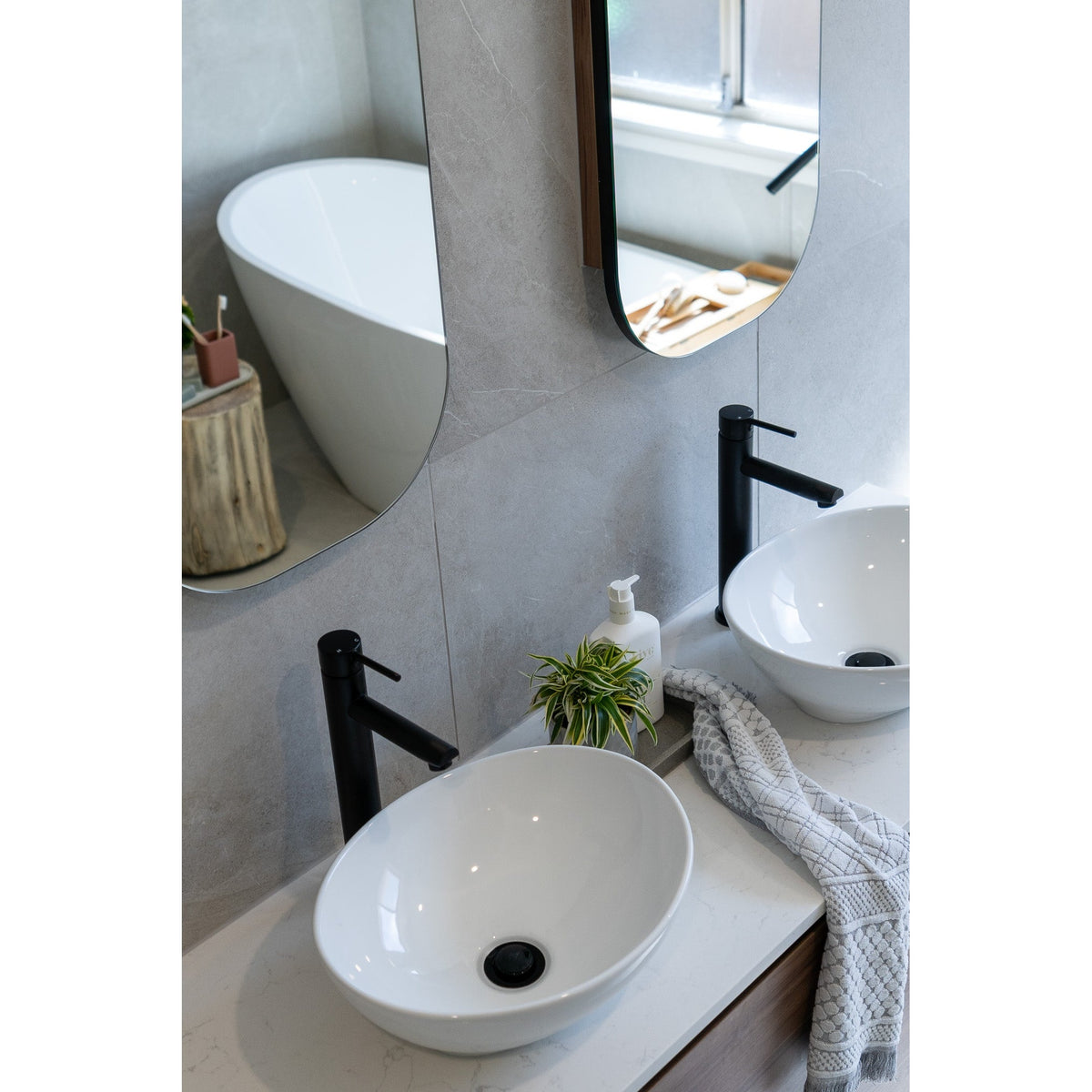 Round Tall Basin Mixer in Matte Black - rear mounting detail